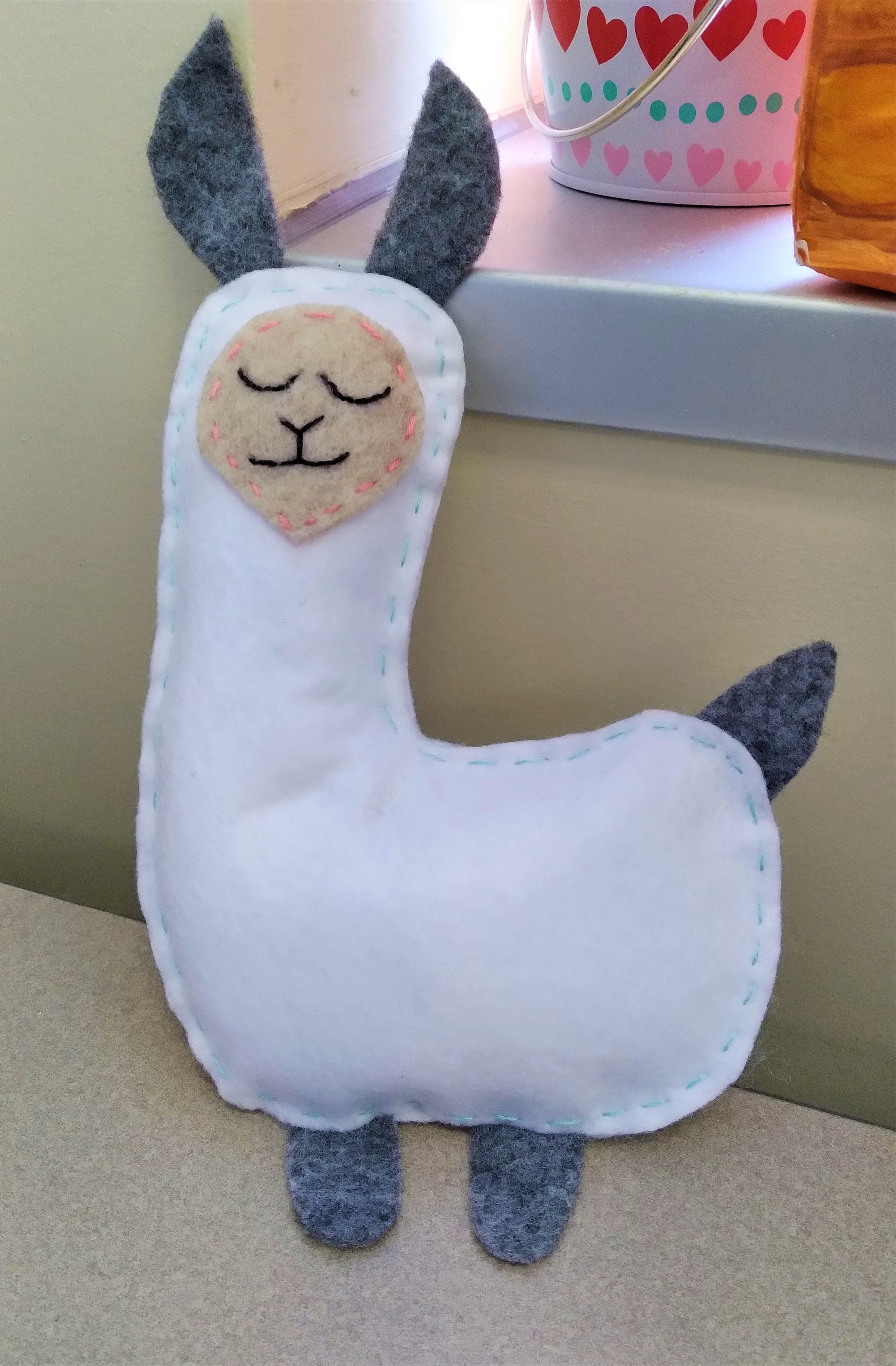 White and gray llama stuffed toy