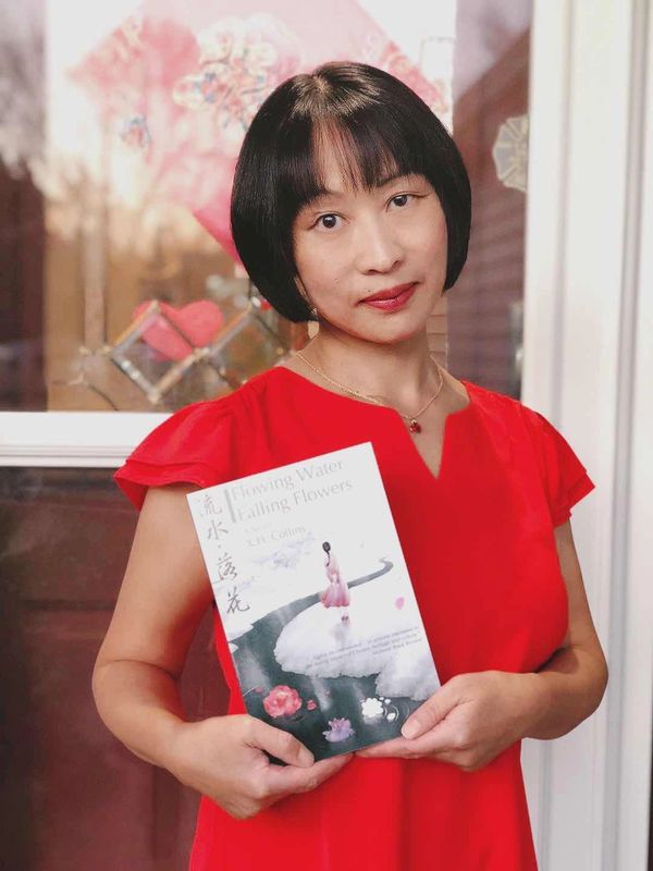 Author Xixuan Collins with book Flowing Water, Falling Flowers