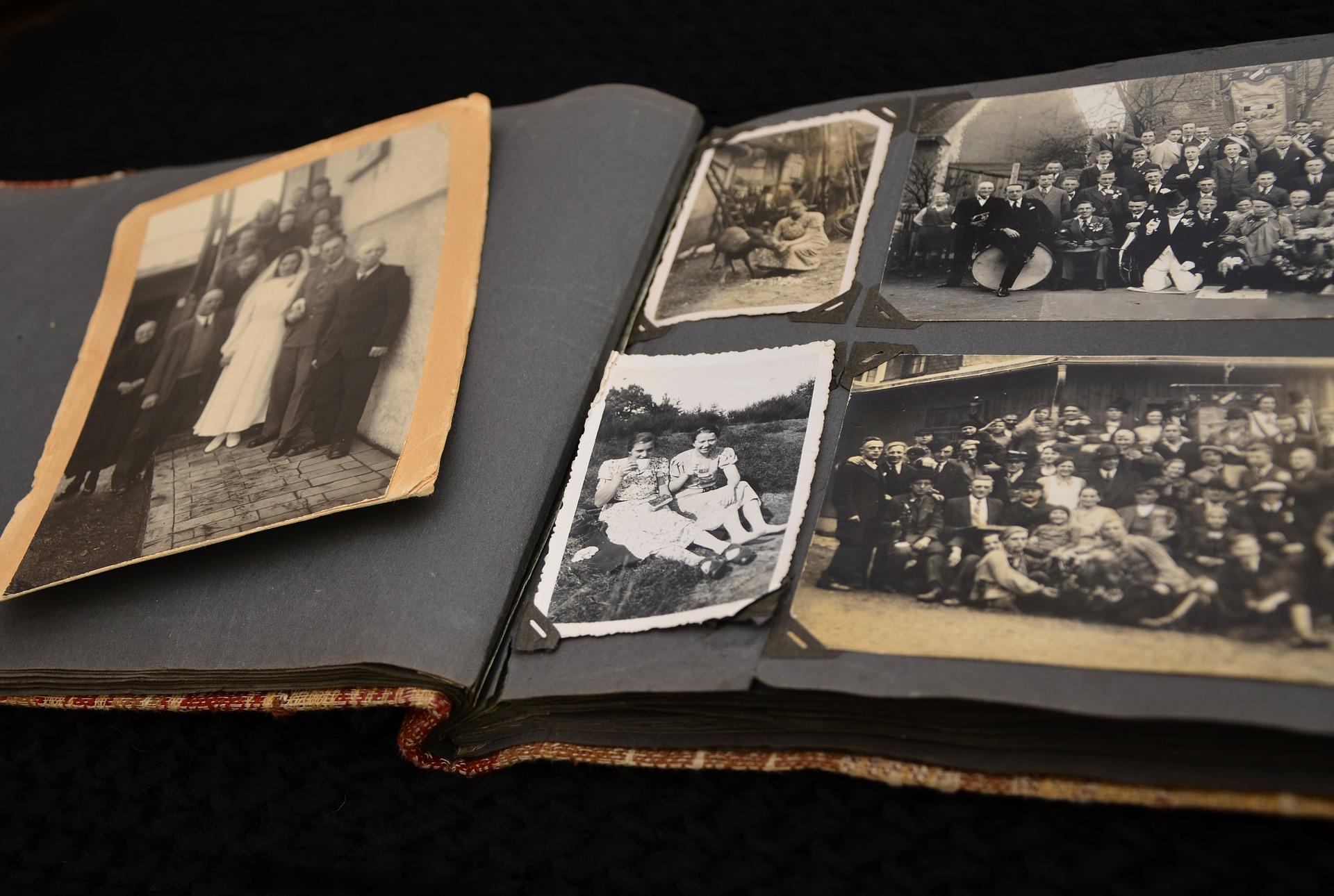 Old photo album with black and white photographs