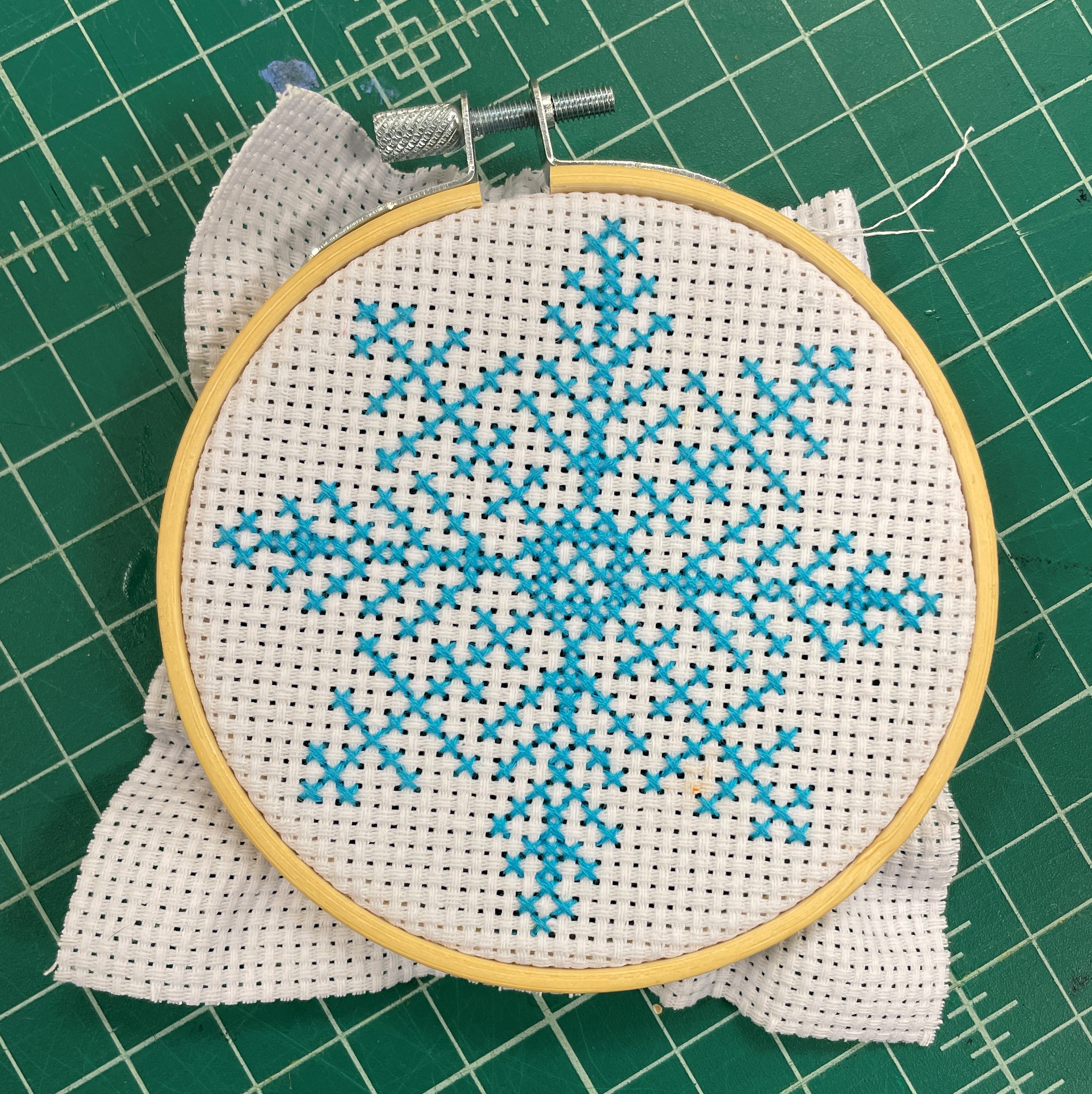 Sew Fun - Cross-Stitching: cross-stitched blue snowflake pictured