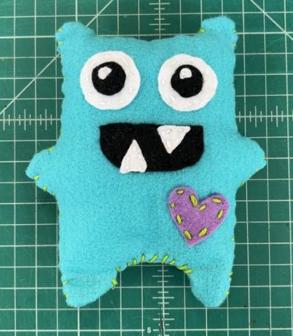 light blue monster plushie