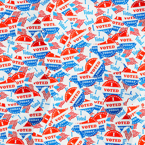 Buttons and stickers labeled "I Voted."