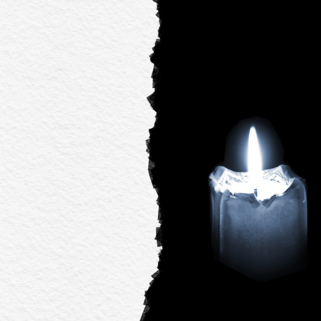 Torn paper near black and white photo of one lit candle.