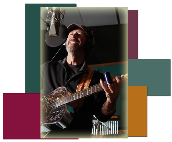 Barry Cloyd playing guitar and singing