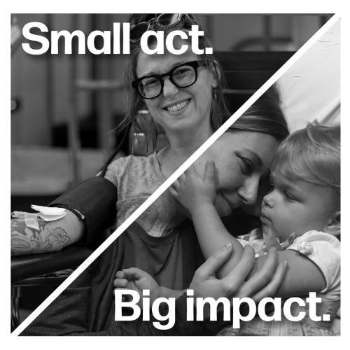 Woman donating blood. Mom snuggling with toddler.